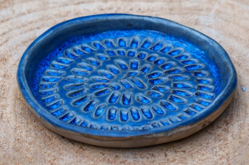 Gratte-ail en céramique bleu