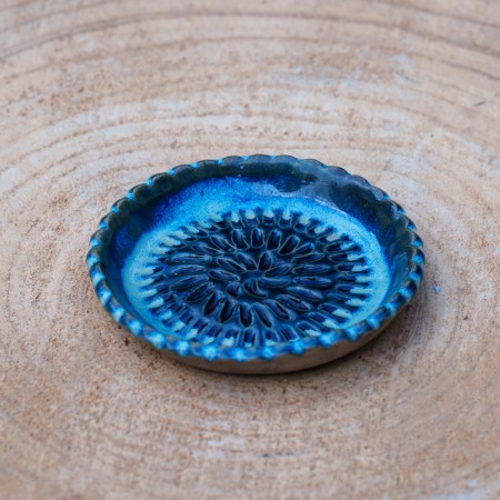 Gratte-ail en céramique bleu et gris