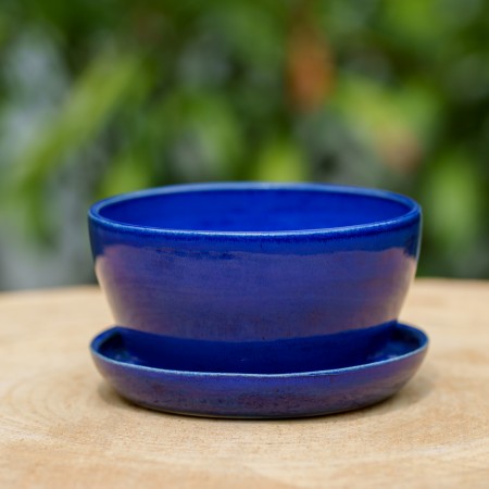 Cache-pot bleu avec soucoupe intégrée