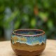 Pot boule brun et bleu
