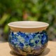 Vase beige, bleu et vert