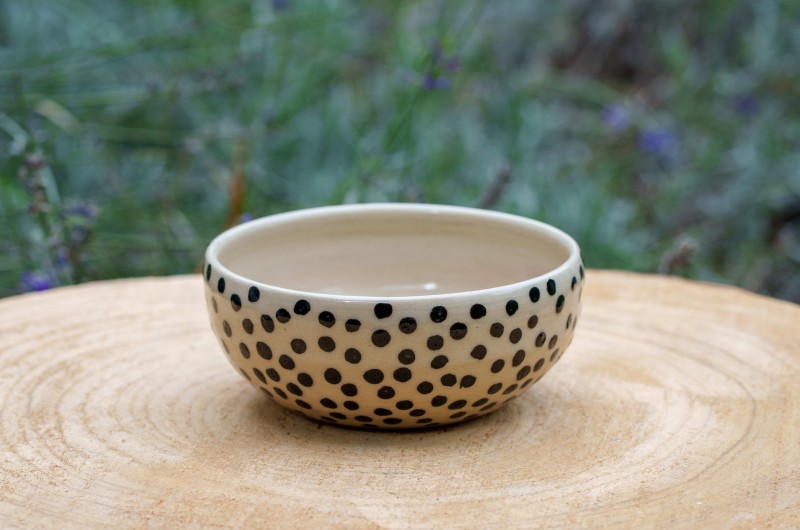Bol beige à pois noirs